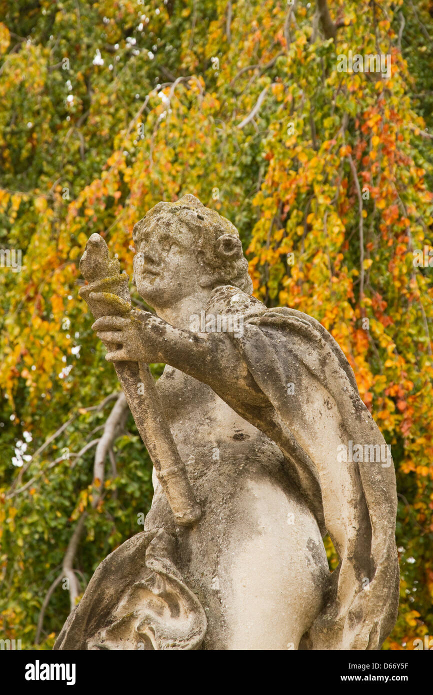 classical statue of man holding torch in grounds of Schloss Sklavkov Moravia Europe Stock Photo