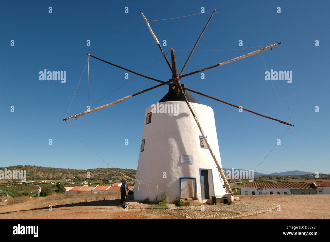 An old style windmill Moinho de Vento in a rural area in Algarve