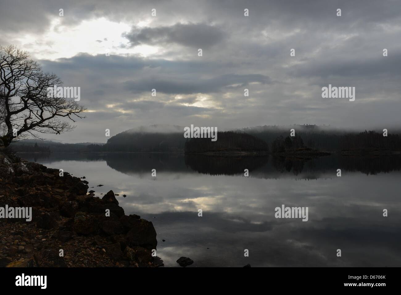 April 14, 2013 : Loch Garry in the morning fog in Scotland. Stock Photo