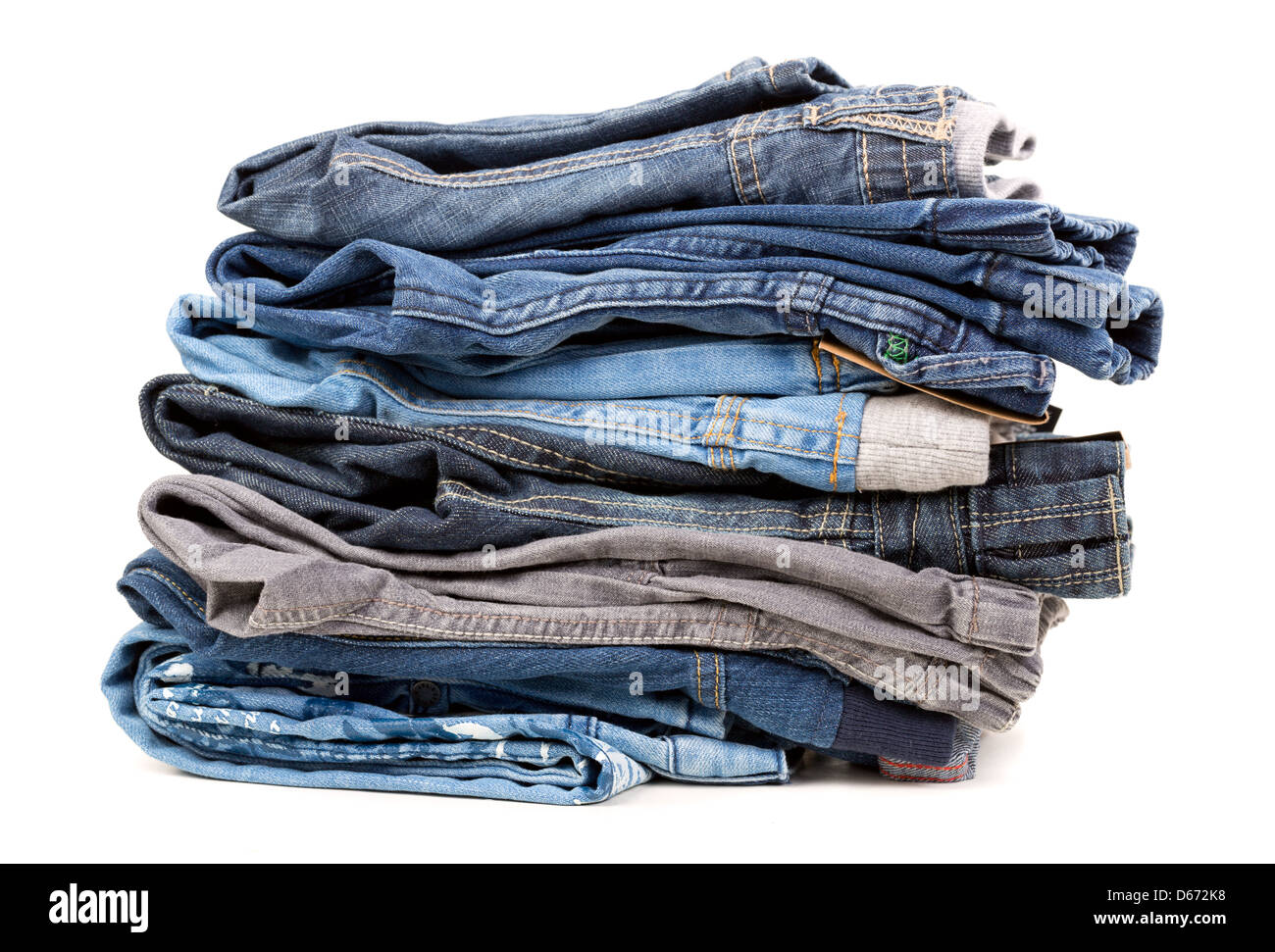 Stack of jeans isolated on white background Stock Photo