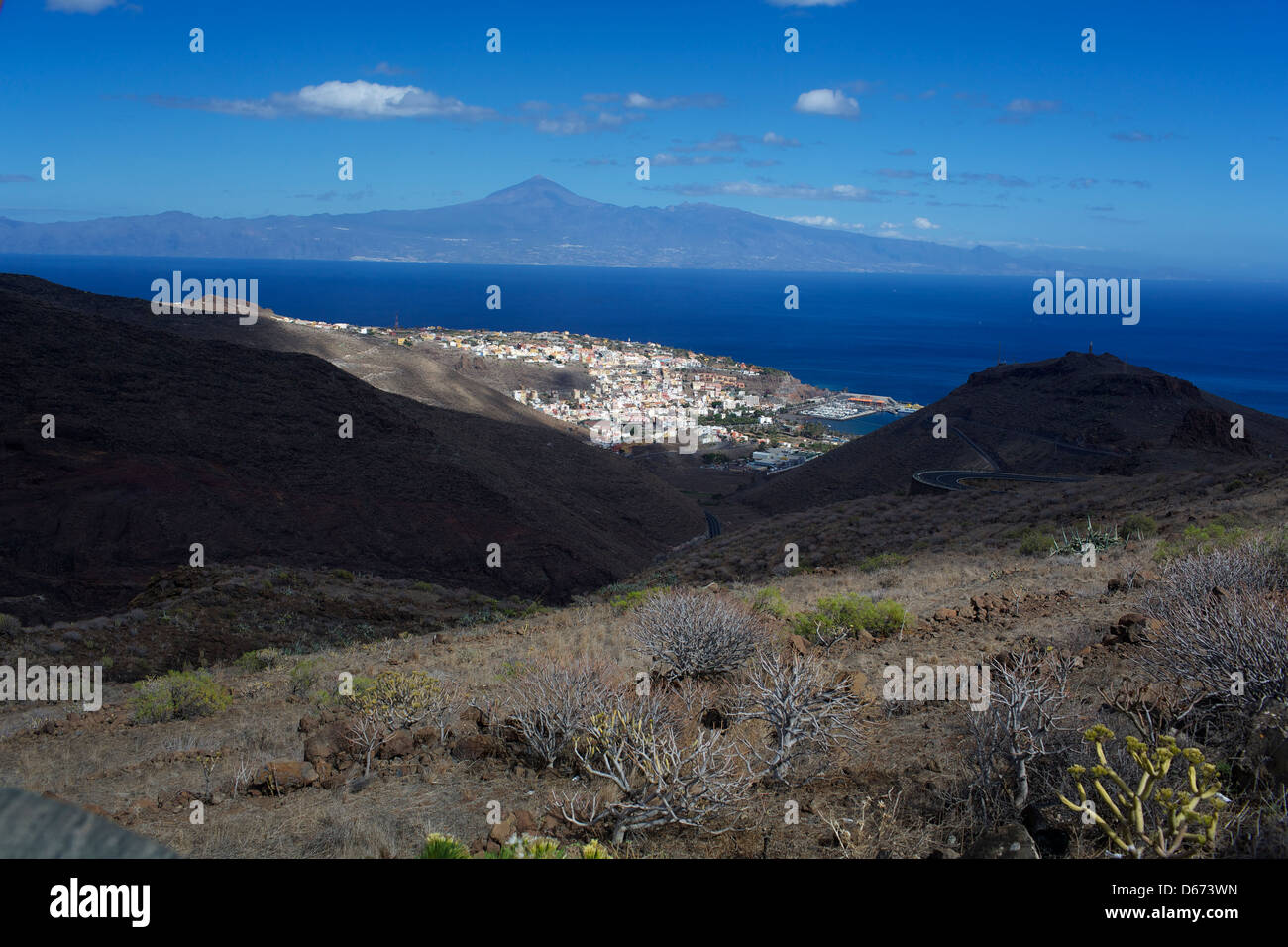 San Sebastian de La Gomera in the sky, the ocean and the island of Tenerife Stock Photo