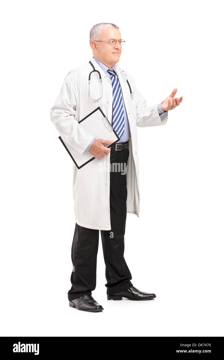 Full length portrait of a male medical doctor in a uniform explaining, isolated on white background Stock Photo