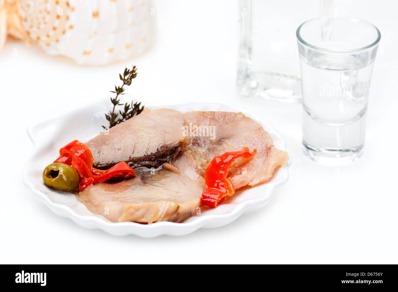 smoked mackerel and pickles served with ouzo Stock Photo