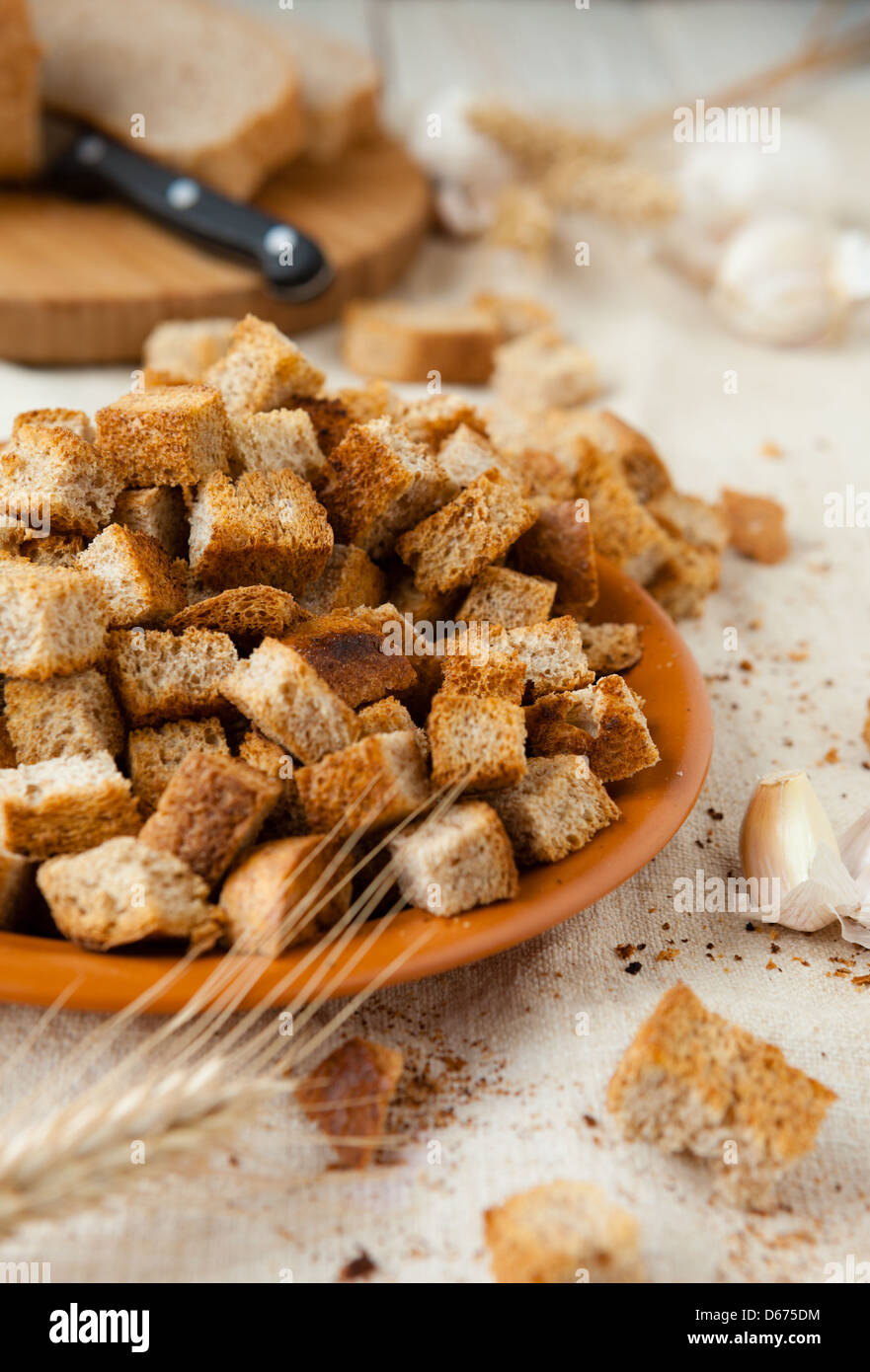 croutons, pile of bread crumbs on a plate closeup Stock Photo Alamy