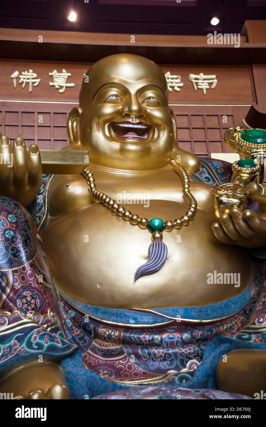 Giant laughing Budha statue in Taiwan museum. Stock Photo