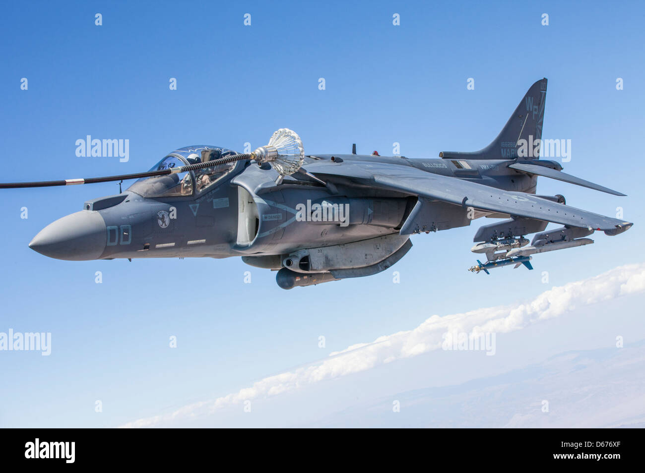 Maj. John Grunke, an AV-8B Harrier pilot with Marine Aviation Weapons and Tactics Squadron 1, trains in his aircraft during the spring Weapons and Tactics Instructors' Course hosted by MAWTS-1 at Marine Corps Air Station Yuma, Ariz., March 30. WTI is a training evolution designed to promote the best possible skills in today's Marine Corps aviators. Stock Photo