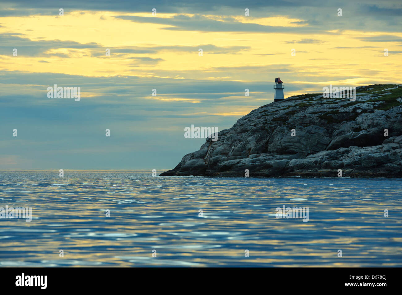 lighthouse, sunset at coastal landscape, lauvsnes, flatanger kommune, nord-trondelag fylke, norway Stock Photo