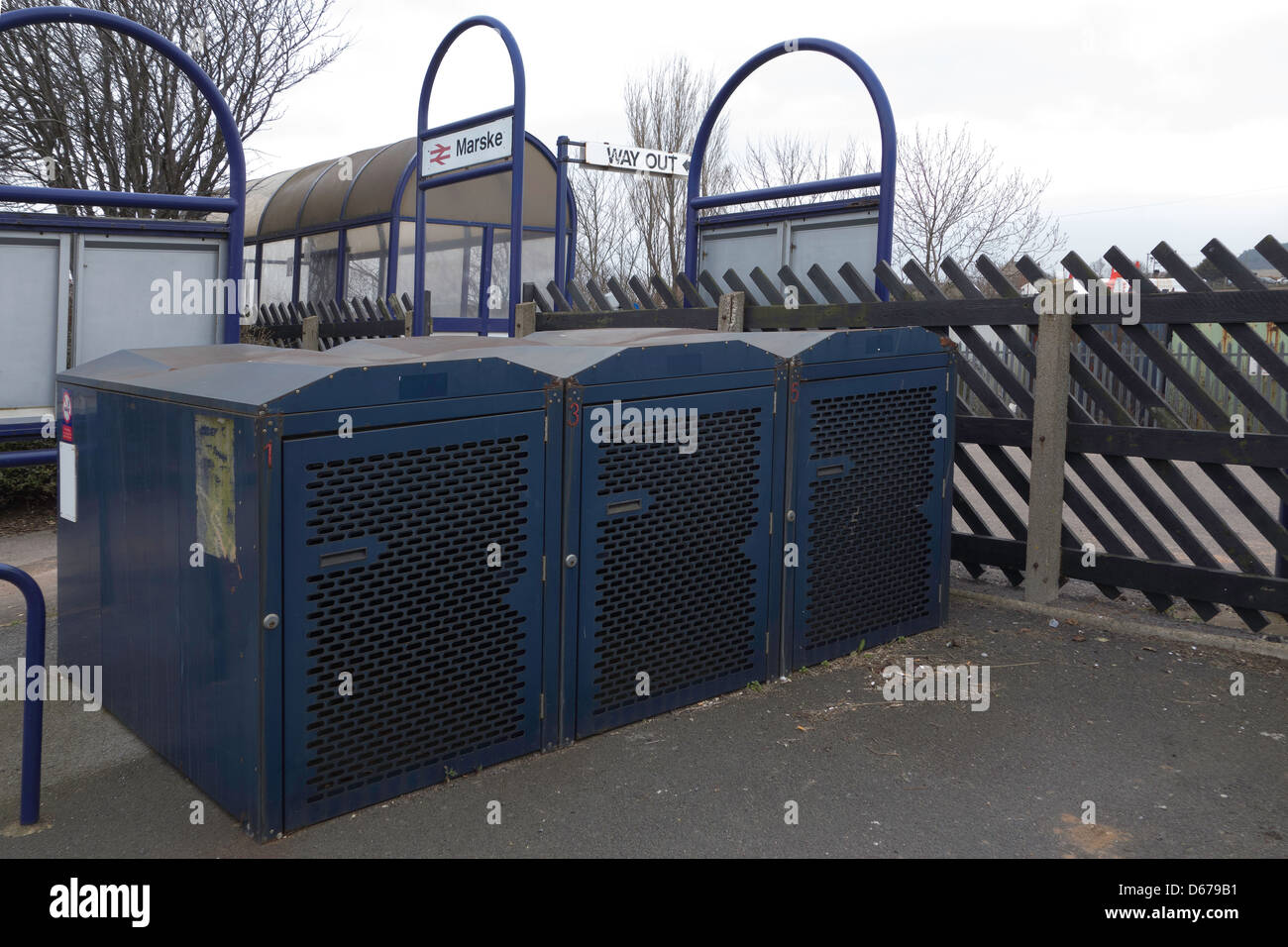 Lock up storage for bicycles at a branch line railway station Stock Photo