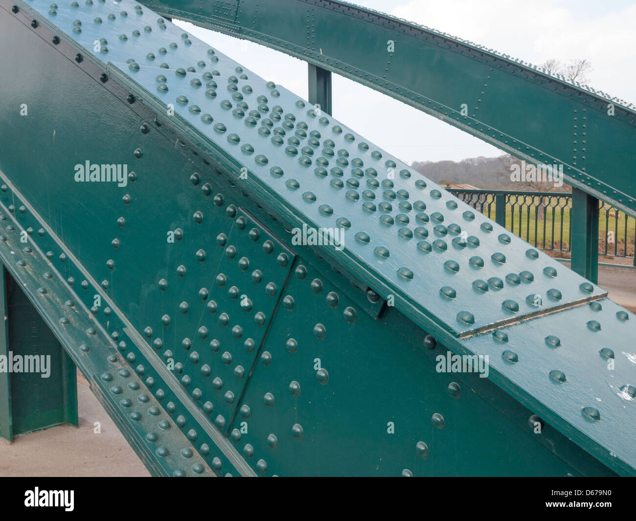 Steel bridge over the River Esk at Ruswarp showing riveted construction typical of the 1930's before welding was introduced Stock Photo