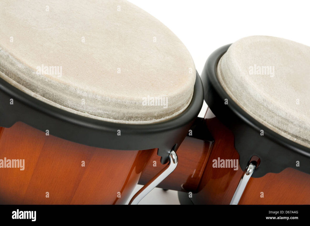 Close-up of bongos on white background. Latin percussion instrument. Stock Photo