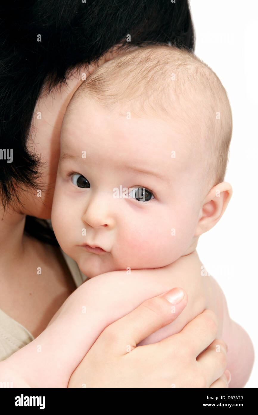 Beautiful baby in mother's hands Stock Photo