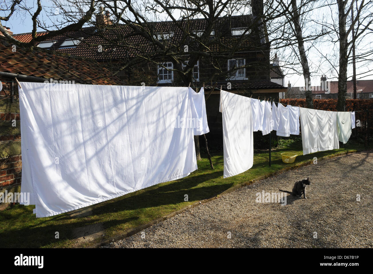 A washing line of sheets and pillowcases hanging in a north yorkshire