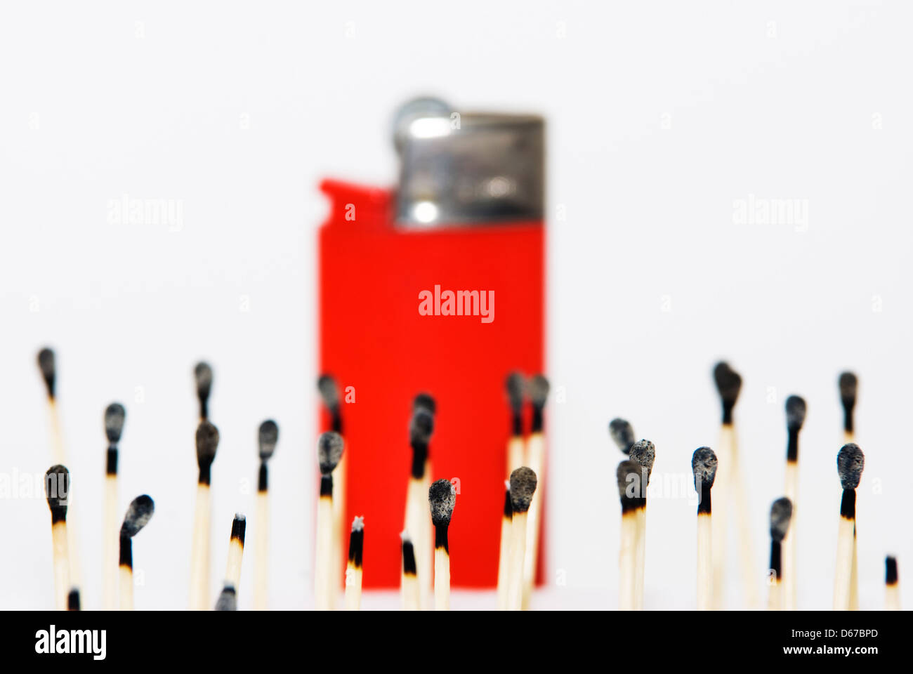 Group matches consumed versus a lighter red Stock Photo Alamy