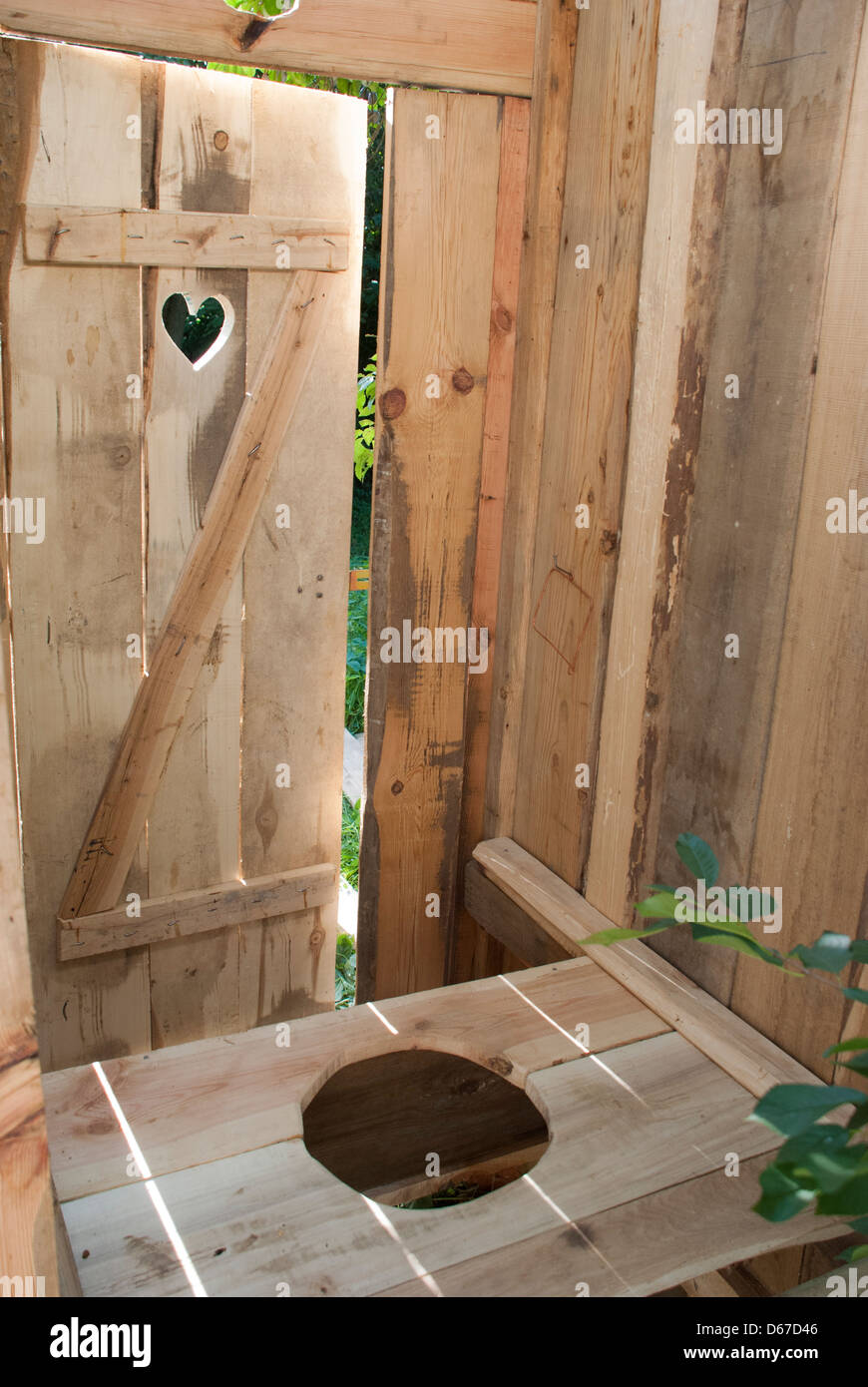 Wooden outdoors eco-toilet Stock Photo