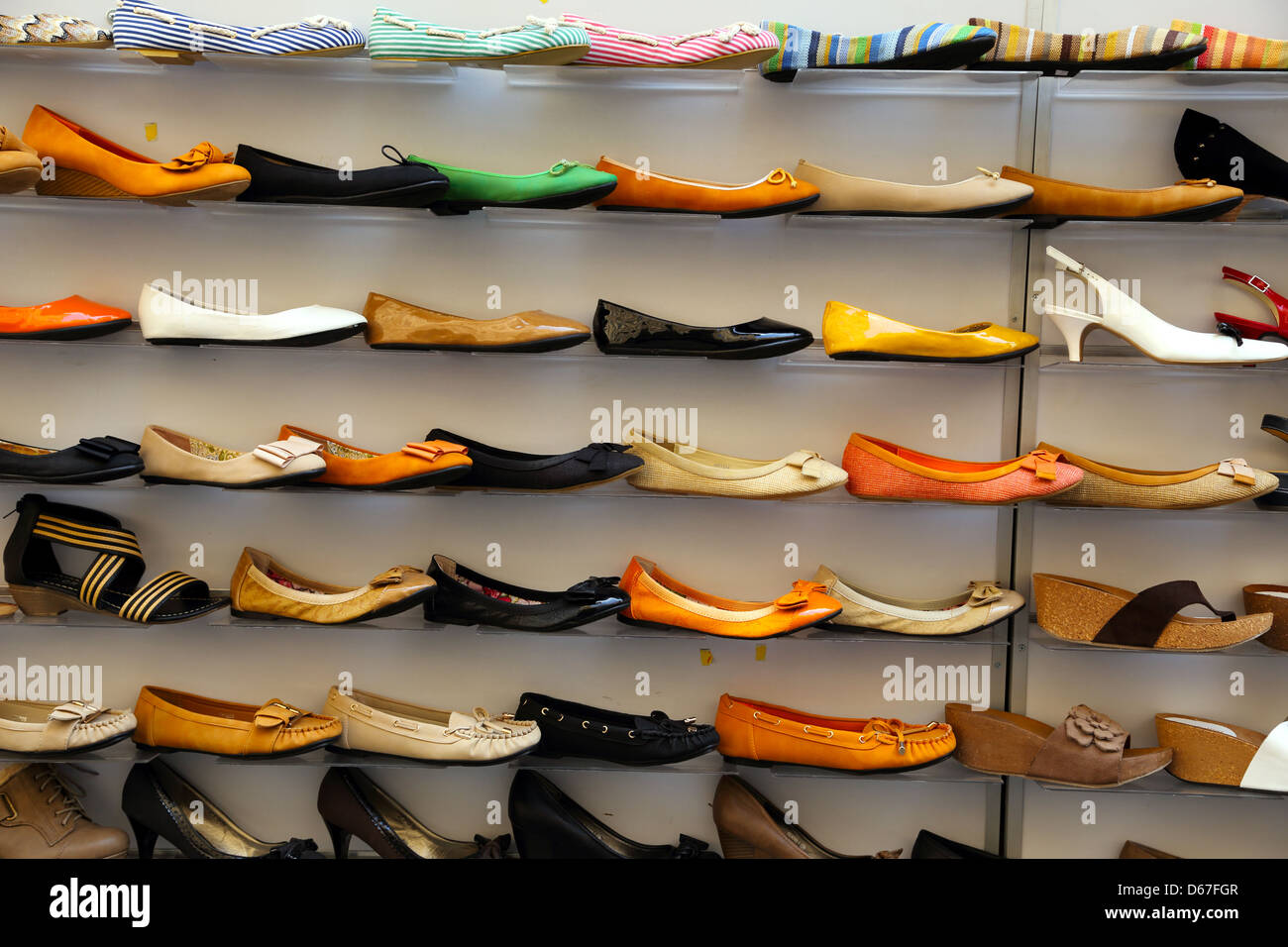 Shoes on display in a market in Florence Italy Stock Photo