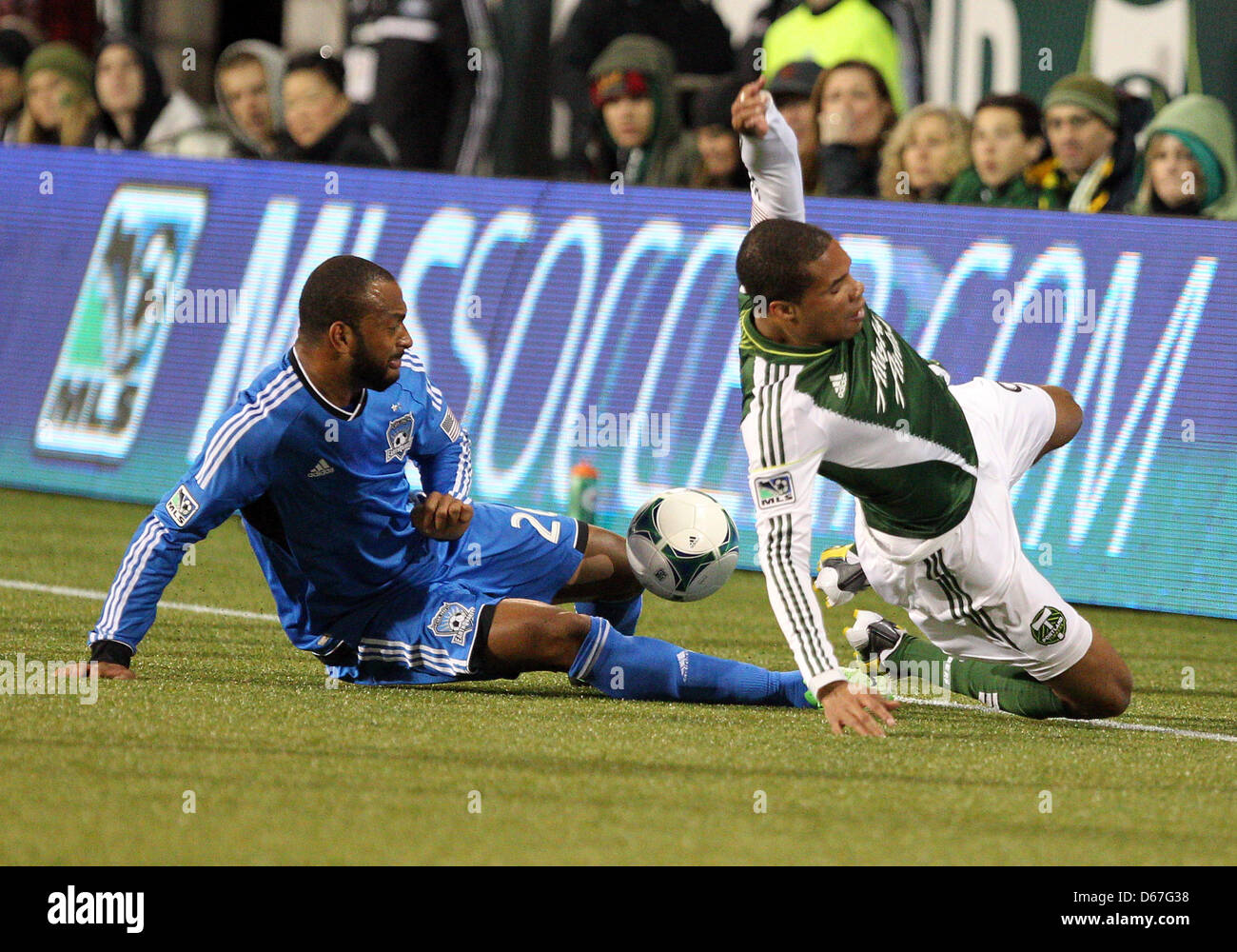 April 14, 2013 - Portland, OR, USA - April 14, 2013: #26 Victor Bernardez of the San Jose Earthquakes and #9 Ryan Johnson of the Portland Timbers collide during the Timbers 1-0 win over the visiting Earthquakes at Jeld Wen Stadium, Portland, OR Stock Photo