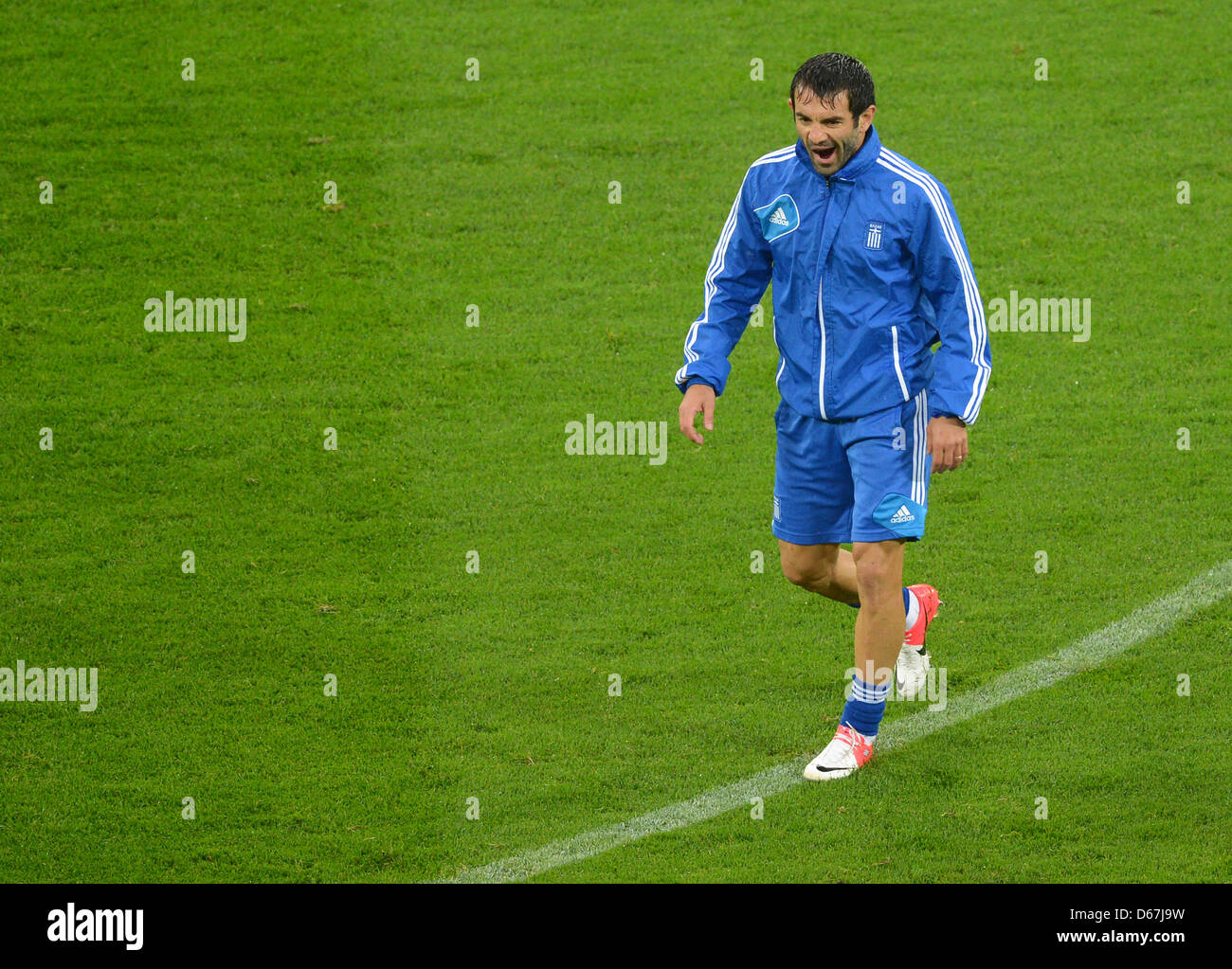 Greece's Georgios Karagounis yawns during a training session of the Greek national soccer team at Arena Gdansk in Gdansk, Poland, 21 June 2012. Photo: Marcus Brandt dpa (Please refer to chapters 7 and 8 of http://dpaq.de/Ziovh for UEFA Euro 2012 Terms & Conditions)  +++(c) dpa - Bildfunk+++ Stock Photo