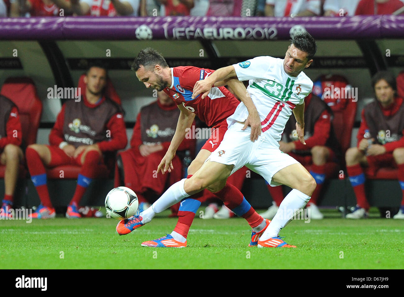 Portugal's Helder Postiga (r) plays against  Czech Republic's Tomas Sivok during a Euro 2012 quarter final match between the Czech Republic and Portugal in Warsaw, Portugal, 21 June 2012. Photo: Revierfoto Stock Photo