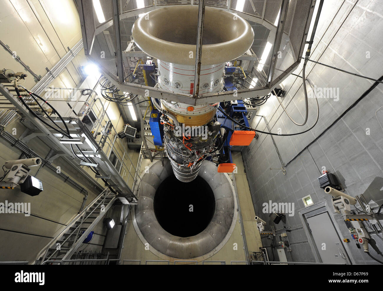 An engine hangs in a testing cell at the Rolls-Royce factory in Dahlewitz,  Germany, 26 June 2012. The company invested 90 million euros in a new test  location for civil large-sized engines.