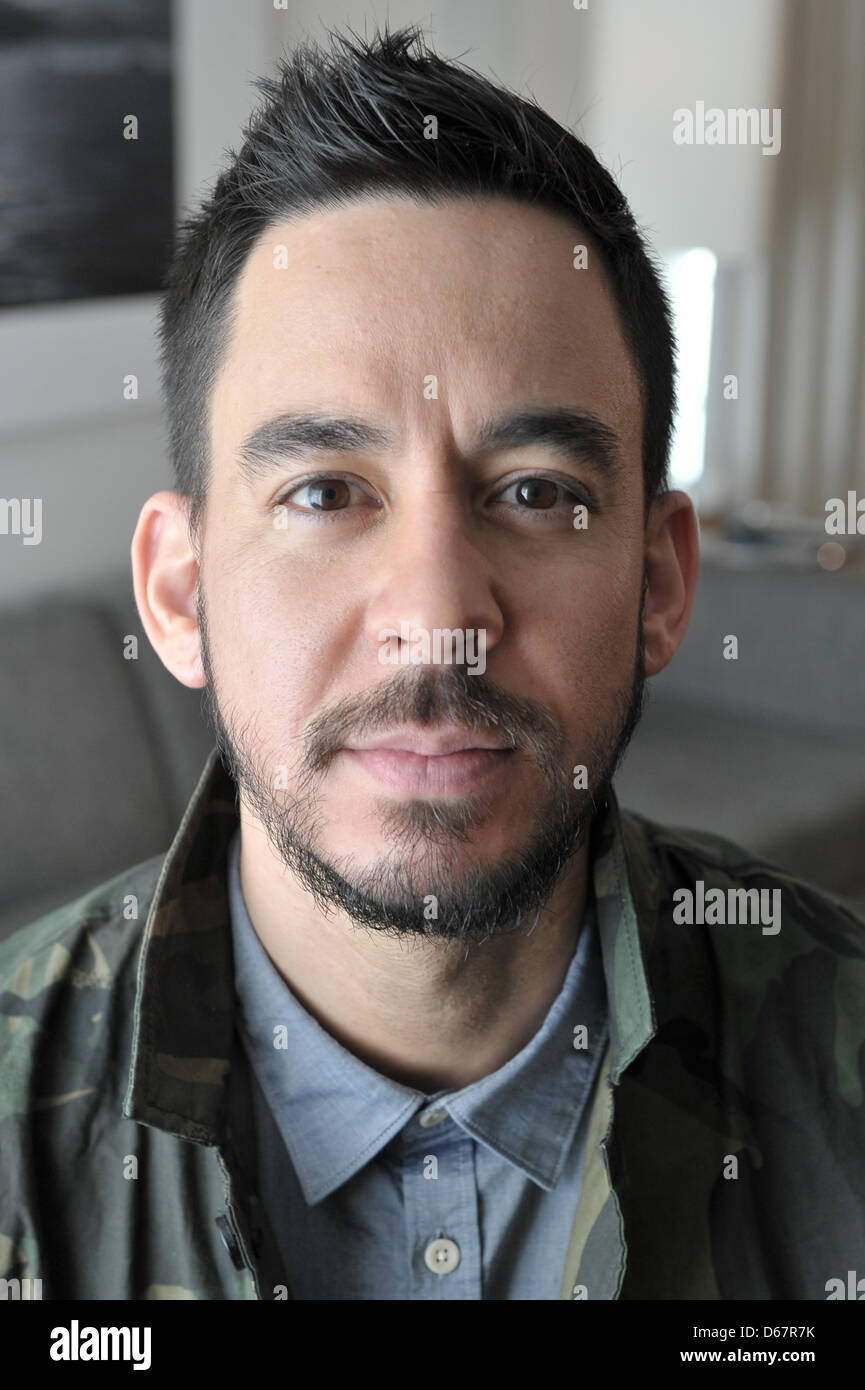 Mike Shinoda, member of the American band Linkin Park, stands in his hotel room after an interview in Berlin, Germany, 07 June 2012. Photo: Marc Tirl Stock Photo