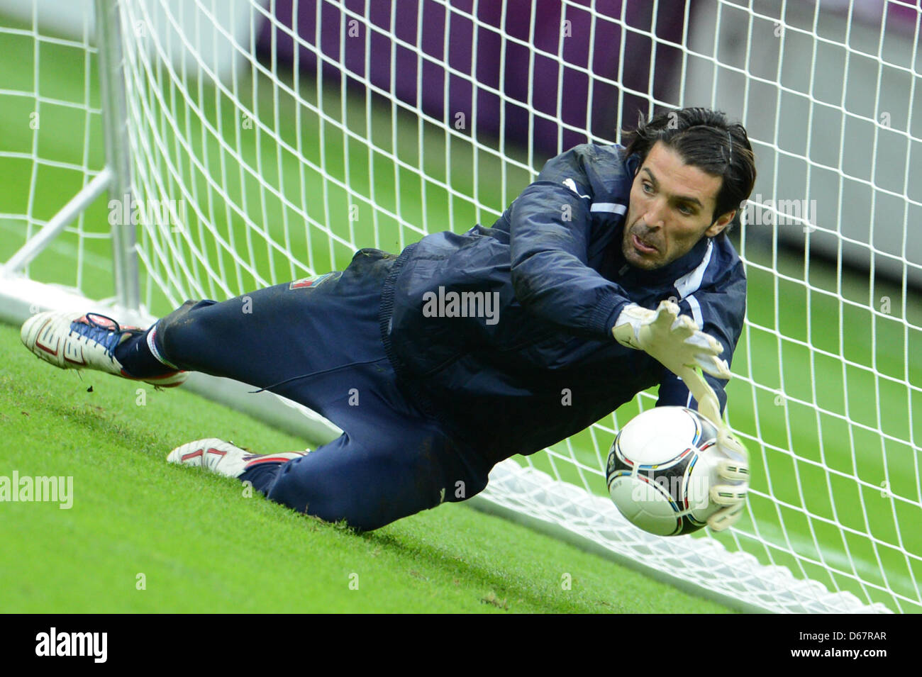 Italy's goalkeeper Gianluigi Buffon catches the ball during a training ...