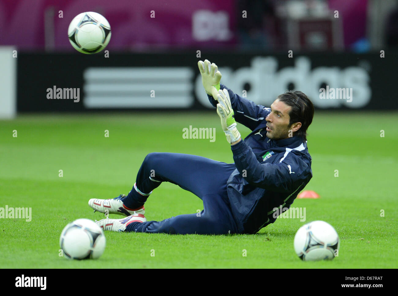 Italy's goalkeeper Gianluigi Buffon catches the ball during a training session of the Italian national soccer team at the National Stadium in Warsaw, Poland, 27 June 2012. Photo: Andreas Gebert dpa (Please refer to chapters 7 and 8 of http://dpaq.de/Ziovh for UEFA Euro 2012 Terms & Conditions) Stock Photo