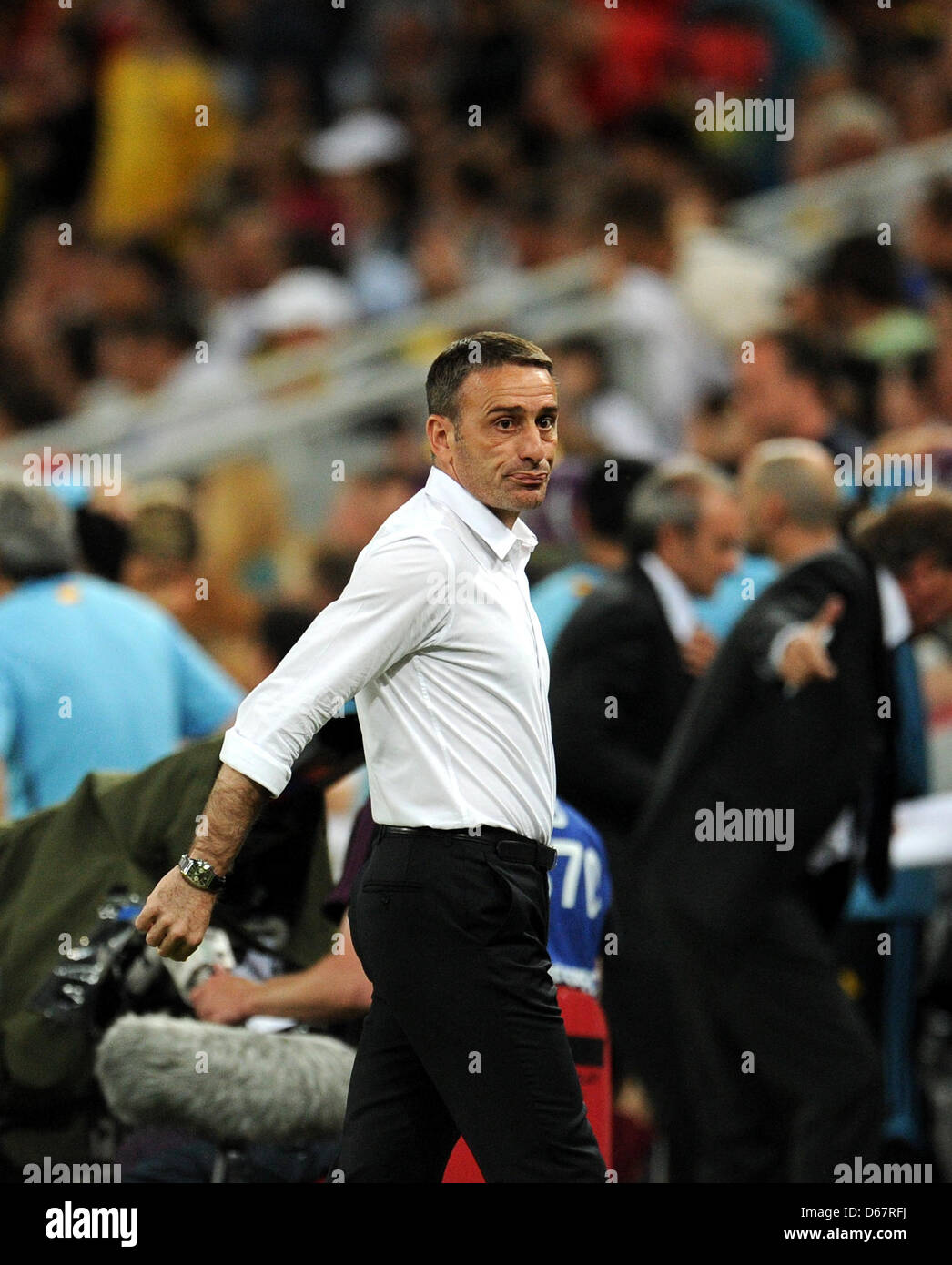 Portugal's coach Paulo Bento reacts during UEFA EURO 2012 semi-final soccer match Portugal vs Spain at Donbass Arena in Donetsk, Ukraine, 27 June 2012. Photo: Thomas Eisenhuth dpa (Please refer to chapters 7 and 8 of http://dpaq.de/Ziovh for UEFA Euro 2012 Terms & Conditions) Stock Photo