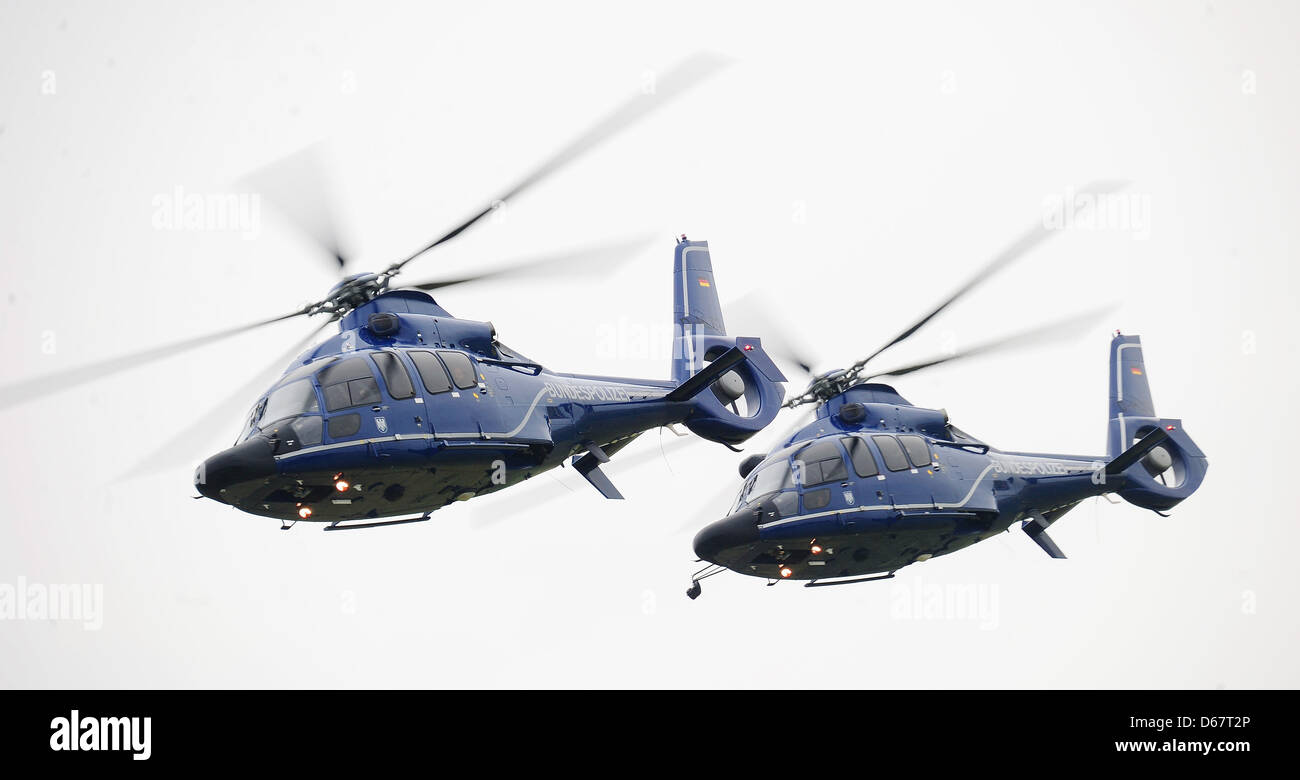 Two Eurocopter EC 155 helicopters take part in an exercise at the site of the flying squadron of the German Fedral Police in Blumber, Germany, 27 June 2012. Photo: Hannibal Hanschke Stock Photo