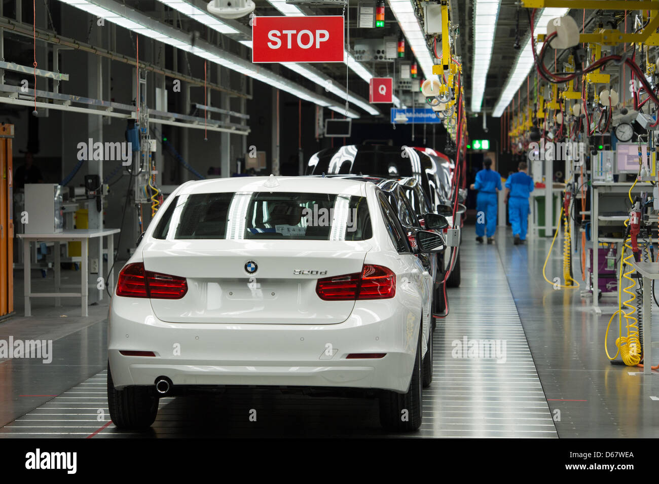 Production stands still at the BMW factory in Regensburg, Germany, 28 June 2012. Around 2,500 staff members of the BMW plant could watch the semi final match of the UEFA EURO 2012 between Germany and Italy which was shown on three big screens. Photo: Armin Weigel Stock Photo