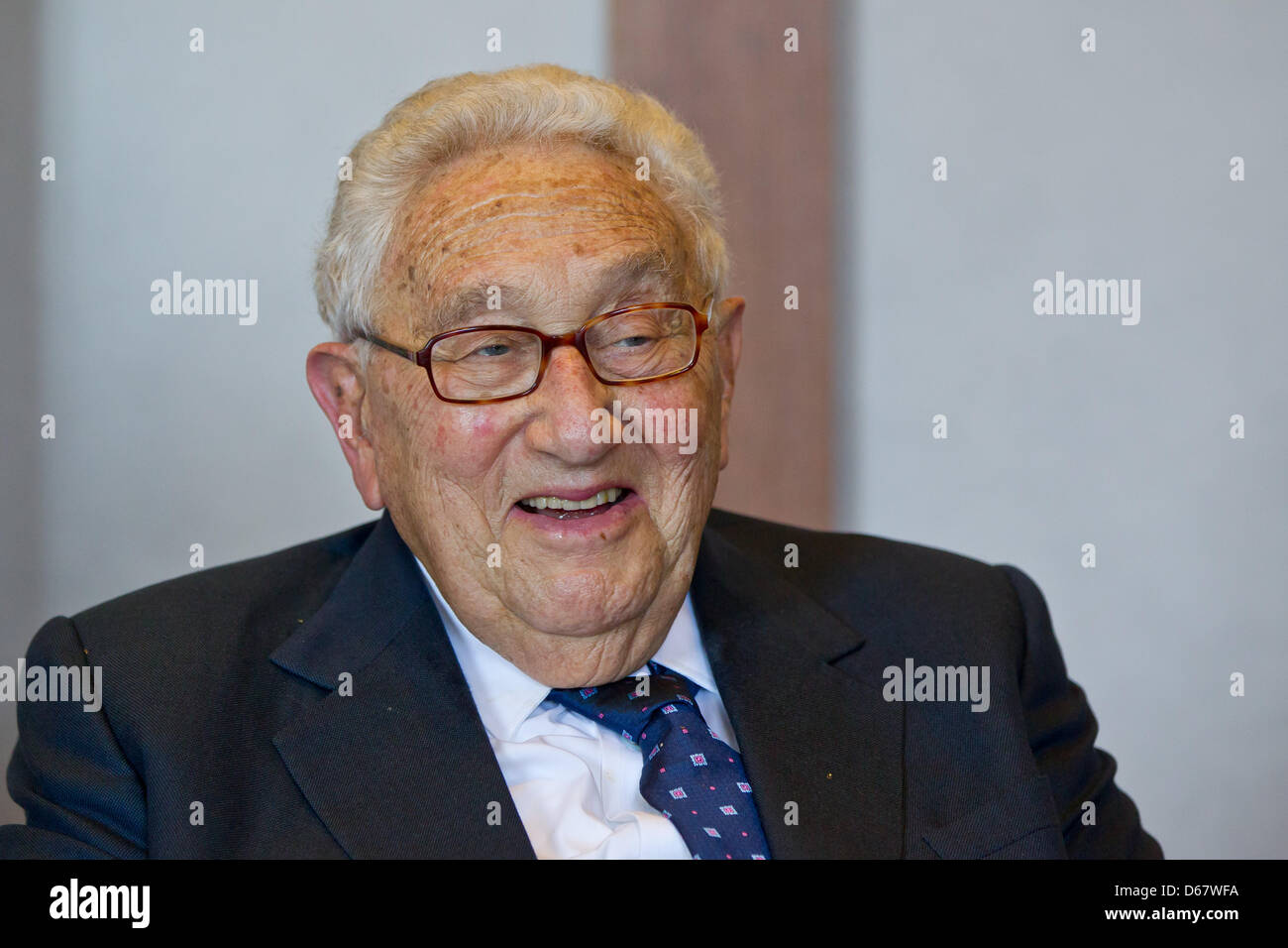 Former US Secretary of State Henry Kissinger poses in the town hall in ...
