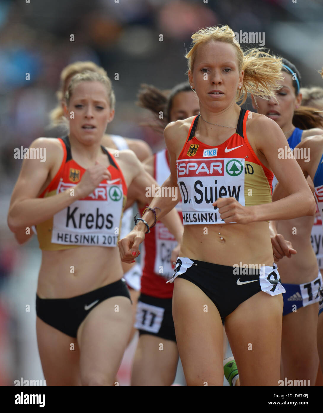 Denise Krebs (L) and Diana Sujew of Germany competes during the womens 1500 M semifinal at the European Athletics Championships 2012 at Olympic Stadium in Helsinki, Finland, 30 June 2012. The European Athletics Championships take place in Helsinki from the 27 June to 01 July 2012. Photo: Bernd Thissen dpa  +++(c) dpa - Bildfunk+++ Stock Photo