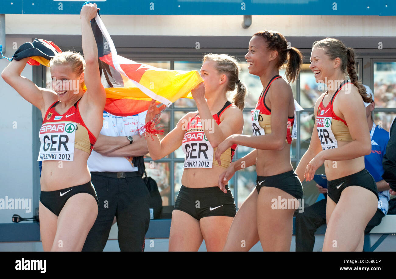 Verena Sailer (L-R), Leena Guenther, Tatjana Pinto and Anne Cibis of Germany celebrate after the women's 4x100 m Relay final at the European Athletics Championships 2012 at Olympic Stadium in Helsinki, Finland, 01 July 2012. The European Athletics Championships take place in Helsinki from the 27 June to 01 July 2012. Photo: Bernd Thissen dpa  +++(c) dpa - Bildfunk+++ Stock Photo