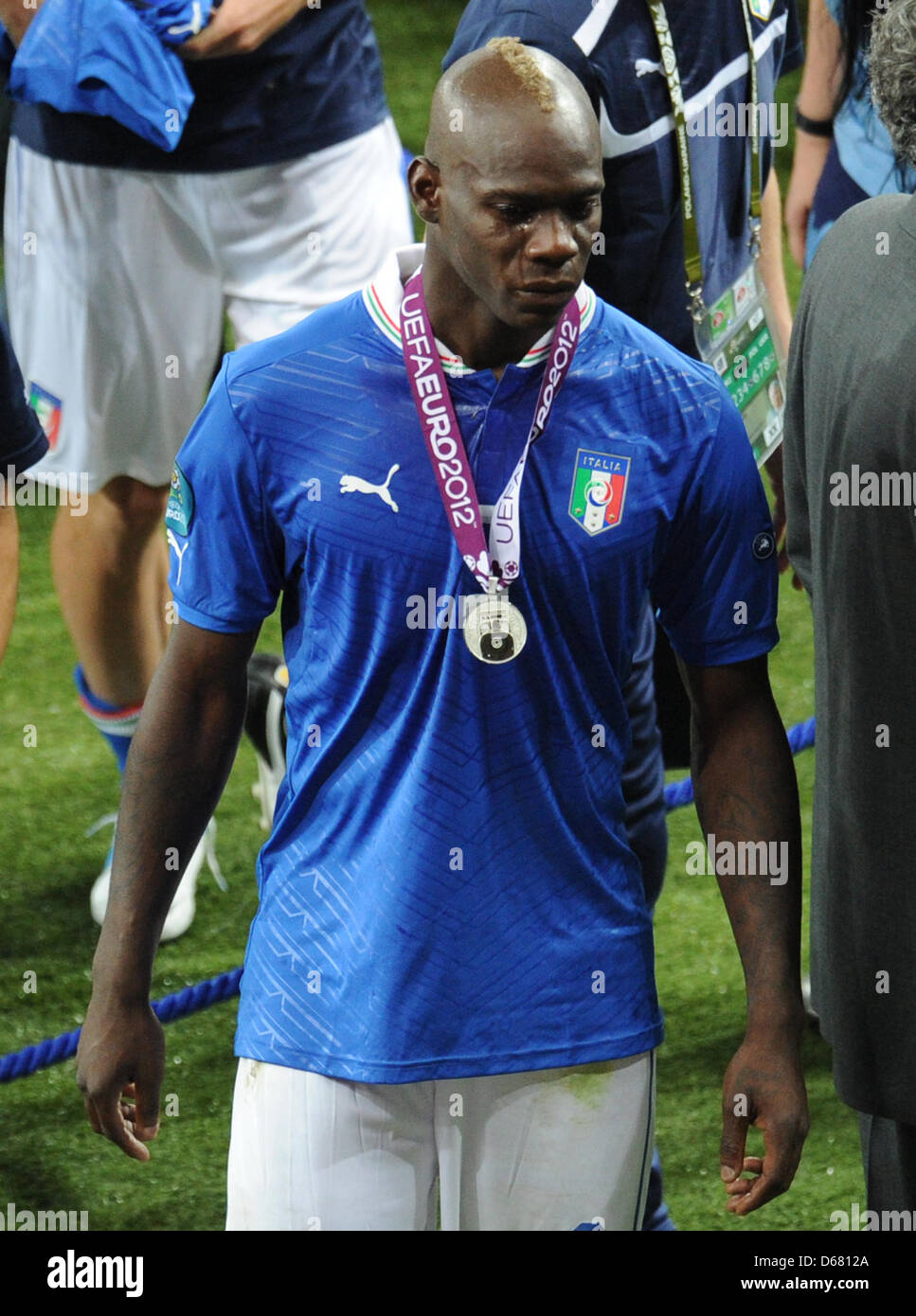 Italian Mario Balotelli cries after losing the UEFA EURO 2012 final soccer  match Spain vs. Italy at the Olympic Stadium in Kiev, Ukraine, 01 July 2012.  Photo: Thomas Eisenhuth dpa (Please refer