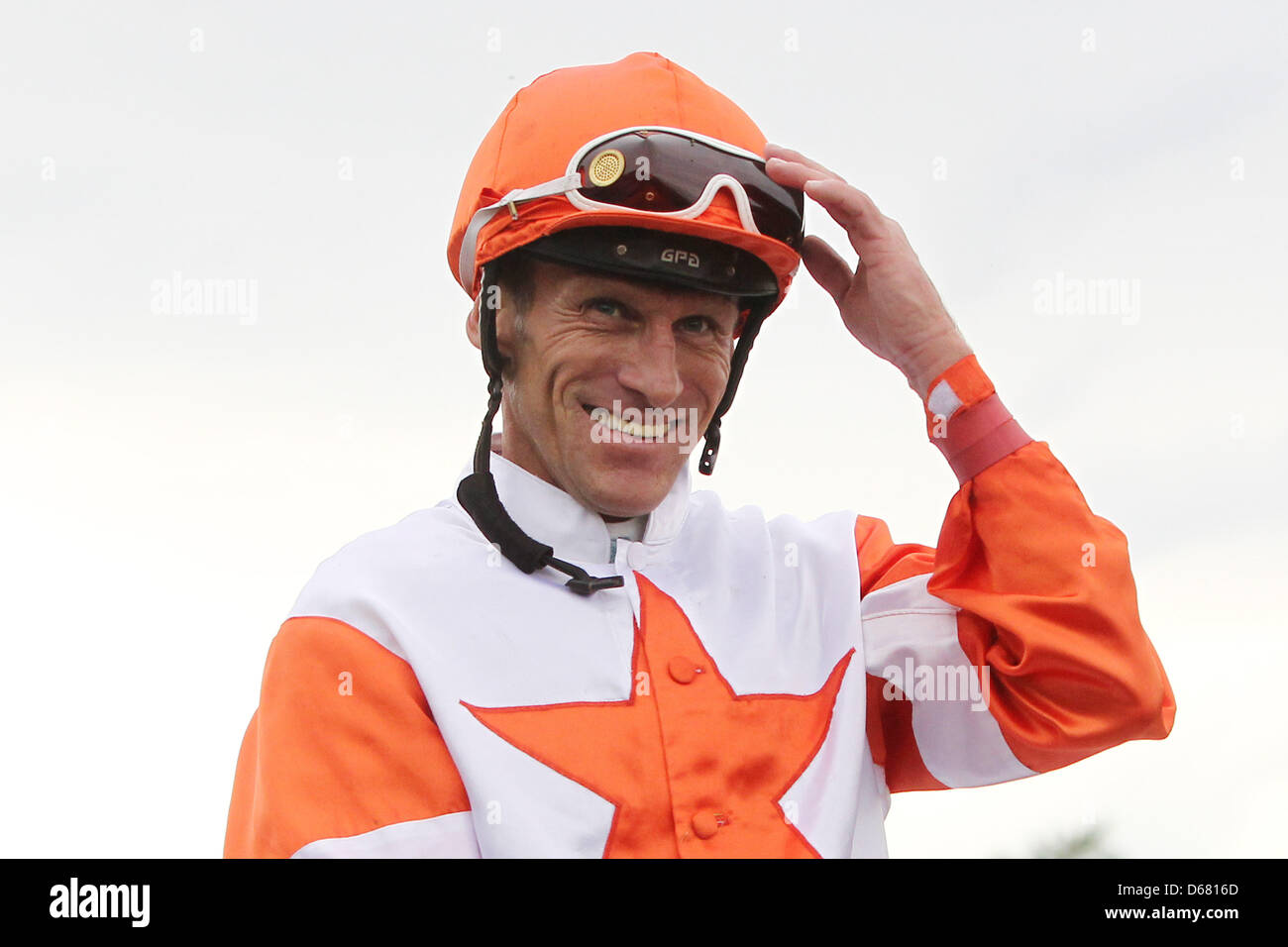 Jockey Terence Hellier sitting on his horse 'Pastorius' cheers after