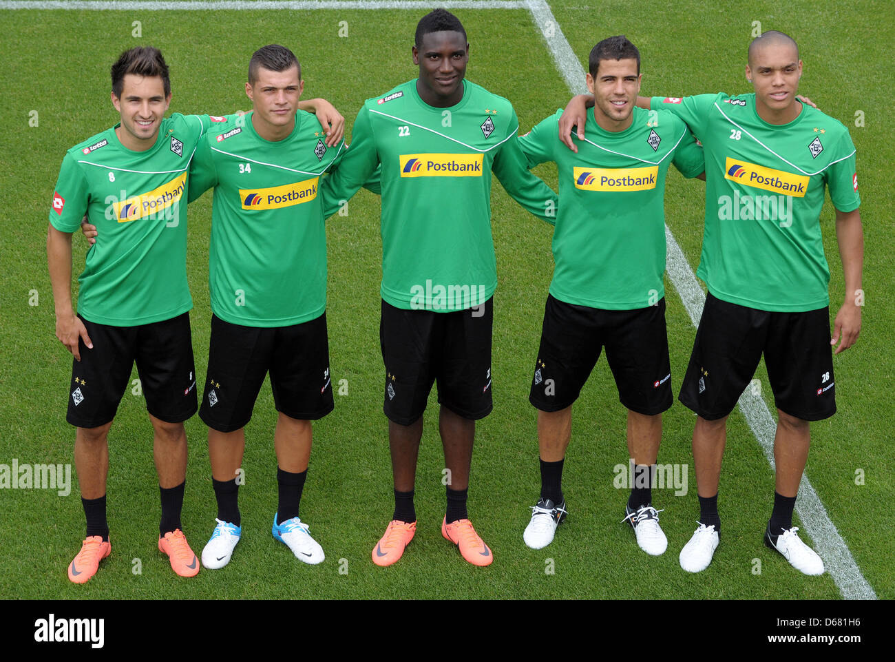 Moenchengladbach's new players Lukas Rupp (L-R), Granit Xhaka, Peniel Mlapa, Alvaro Dominguez and Bamba Anderson pose for the cameras during the start of training after the summer break on the premises of the Bundesliga soccer club in Moenchengladbach, Germany, 02 July 2012.   Borussia Moenchengladbach has started its preparations for the coming Bundesliga season. Photo: FEDERICO G Stock Photo