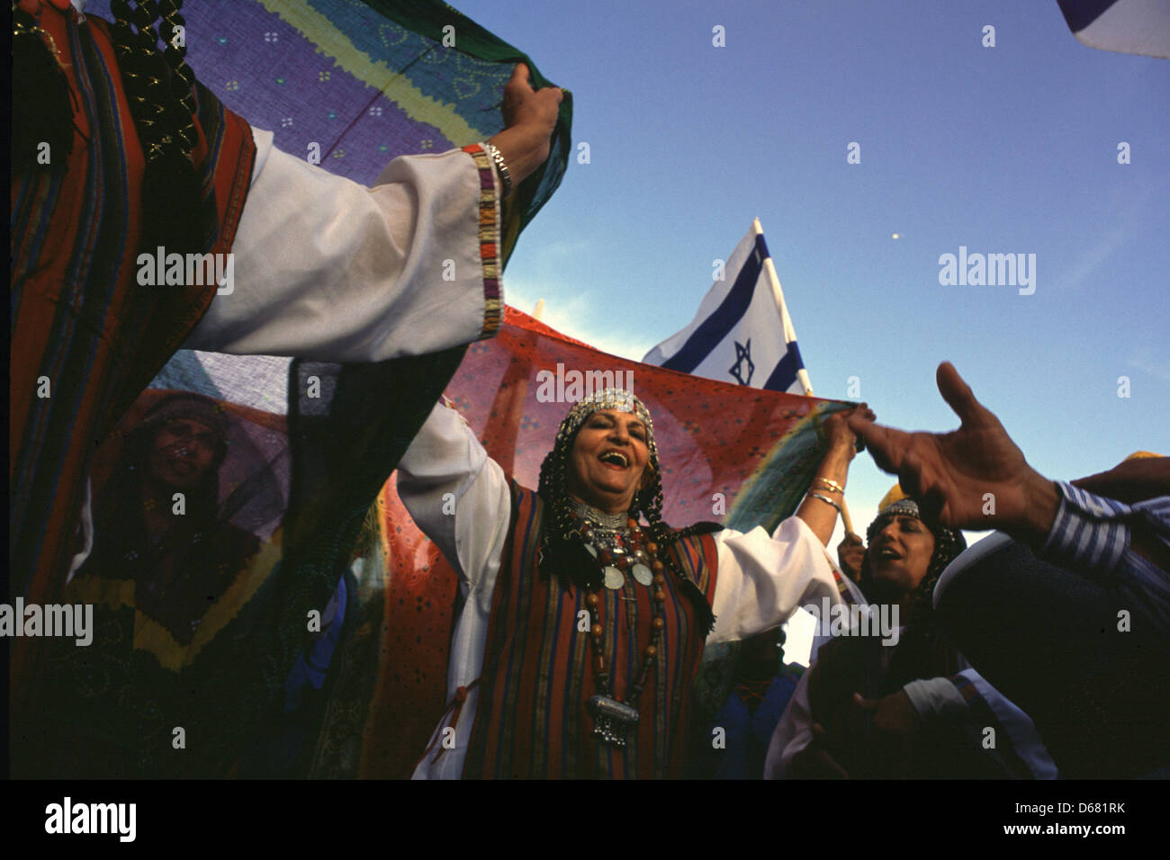 Members of the Yemeni Jewish community in traditional outfit dancing during Jerusalem Day or Yom Yerushalayim an Israeli national holiday commemorating the reunification of Jerusalem and the establishment of Israeli control over the Old City in the aftermath of the June 1967 Six-Day War. Stock Photo