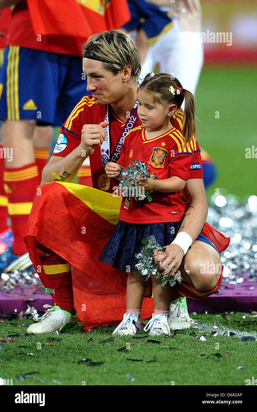 Spain's Fernando Torres holds his daughter after the UEFA cup after the UEFA EURO 2012 final soccer match Spain vs. Italy at the Olympic Stadium in Kiev, Ukraine, 01 July 2012. Spain won 4-0. Photo: Revierfoto Stock Photo