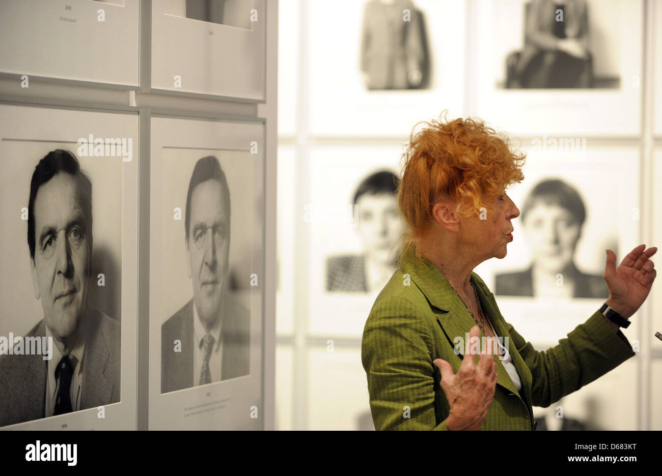 Photographer Herlinde Koelbl stands in front photographs at her exhibition titled 'Looking for Traces - Photographies of Herlinde Koelbl' at Haus der Geschichte in Bonn, Germany, 04 July 2012. 400 photographs by Koelbl are on display. Photo: FEDERICO GAMBARINI Stock Photo