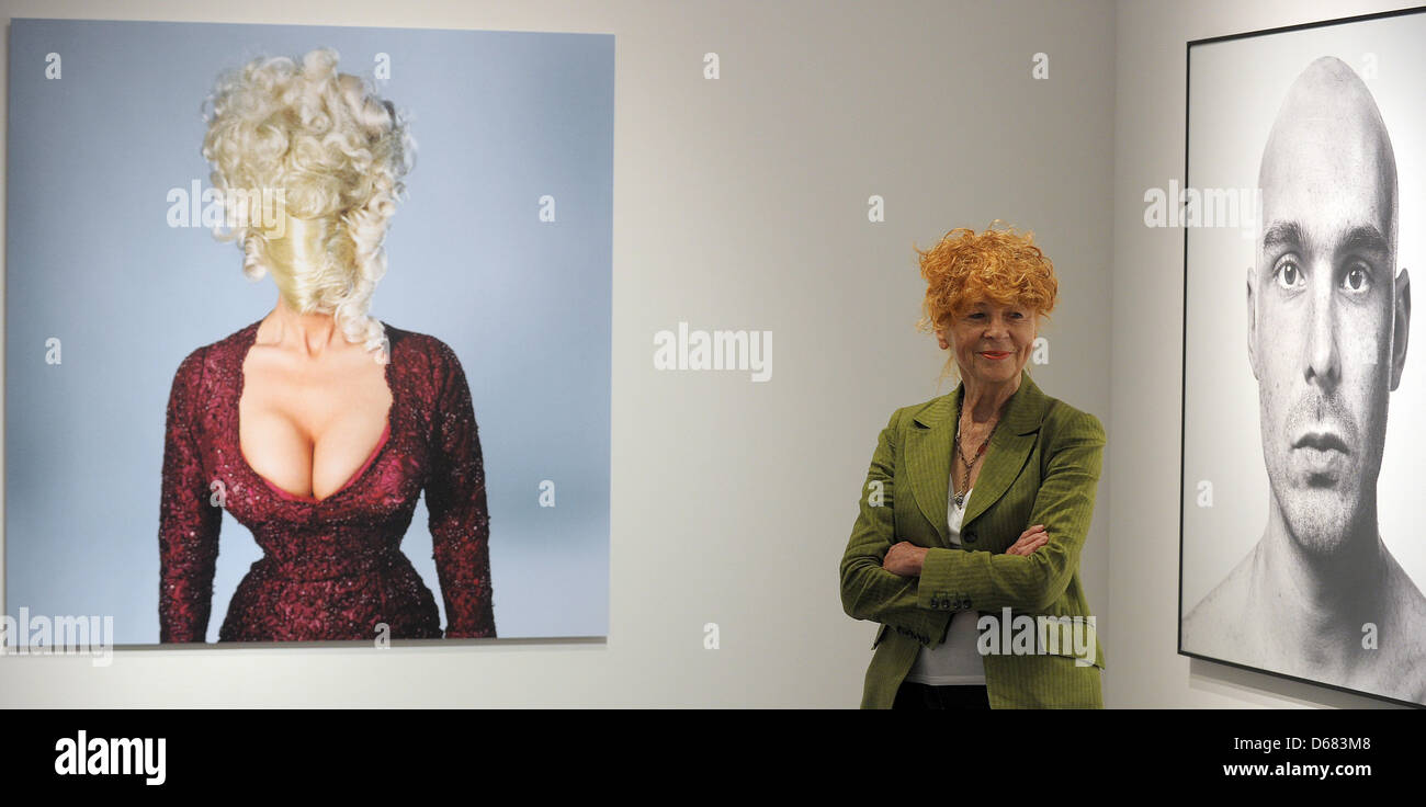 Photographer Herlinde Koelbl poses in front photographs at her exhibition titled 'Looking for Traces - Photographies of Herlinde Koelbl' at Haus der Geschichte in Bonn, Germany, 04 July 2012. 400 photographs by Koelbl are on display. Photo: FEDERICO GAMBARINI Stock Photo