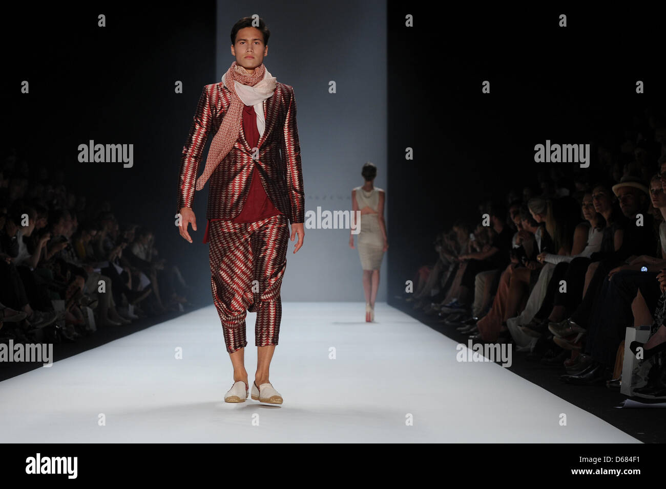 Models presenting creations of Polish fashion designer Dawid Tomaszewski collection during the Mercedes Benz Fashion Week in Berlin Germany 04 July 2012. The presentation of the Spring Summer 2013 col...