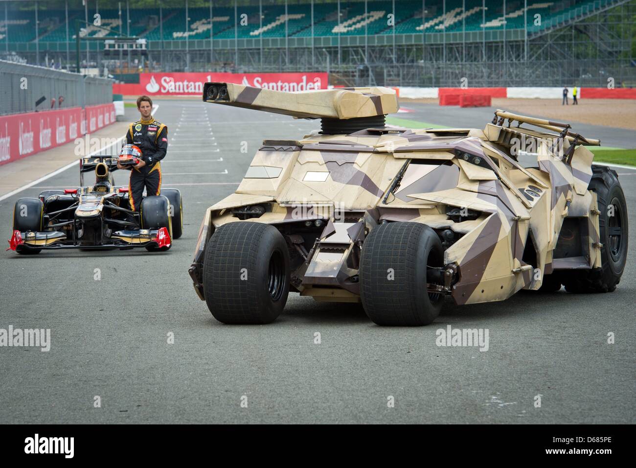 The Batmobile Tumbler passes French Formula One driver Romain Grosjean ...