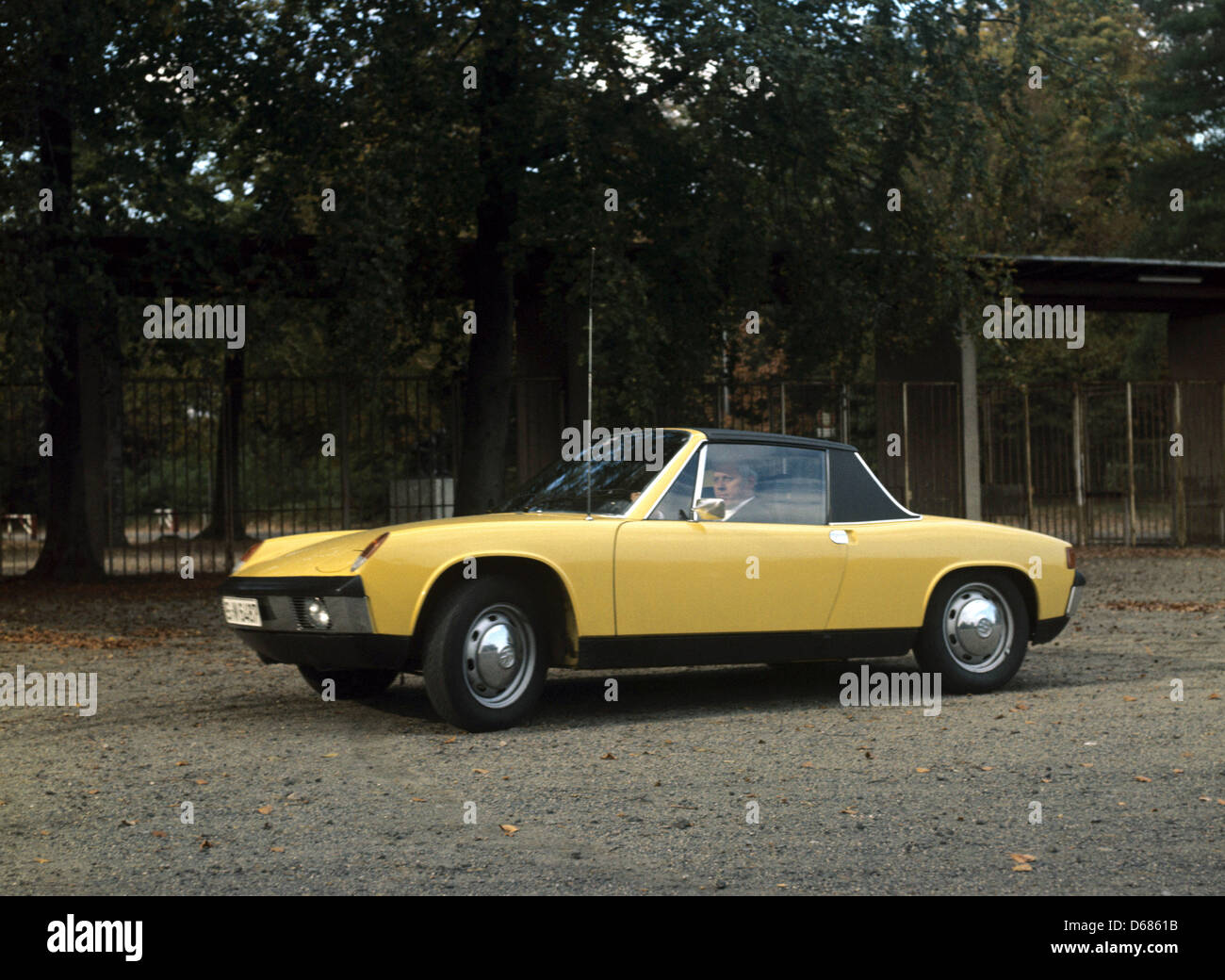 FILE - An undated archive picture shows a yellow Type 914 VW.Porsche. Porsche 914 was a joint venture of Volkswagen and Porsche and was built from the 1960s till 1976. The car used to be colloquially named as 'People's Porsche'. Car manufacturer Volkswagen (VW) is going to completely take over Porsche's sports car branch, announced VW on 04 July 2012. The takeover is to be complete Stock Photo