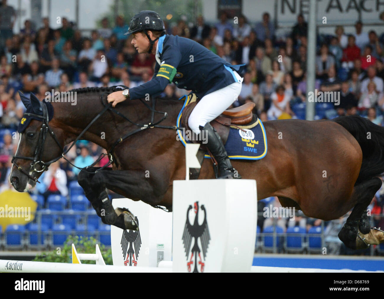 Swedish Show Jumper Rolf Goran Bengtsson And Horse Casall Jump Over An Obstacle During Chio World Equestrian Festival In Aachen Germany 05 July 2012 Photo Jochen Luebke Stock Photo Alamy