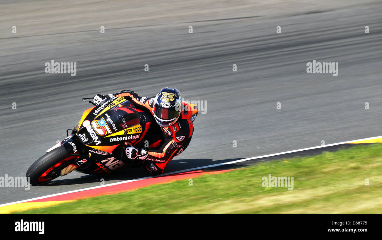American MotoGP racer Colin Edwards of Team NGM Mobile Forward Racing rides his motorcycle in a training round for the German Grand Prix at Sachsenring in Hohenstein-Ernstthal, Germany, 06 July 2012. Photo: JAN WOITAS Stock Photo