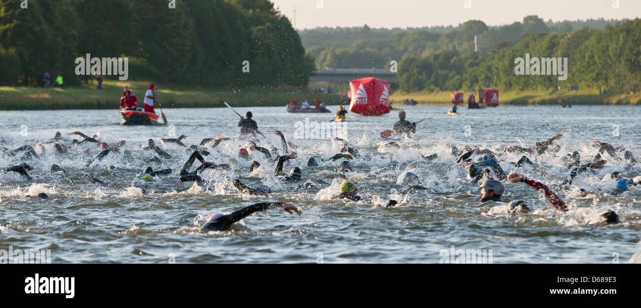 Challenge Roth Swim Triathletes start swimming during the Triathlon Challenge Roth in ...