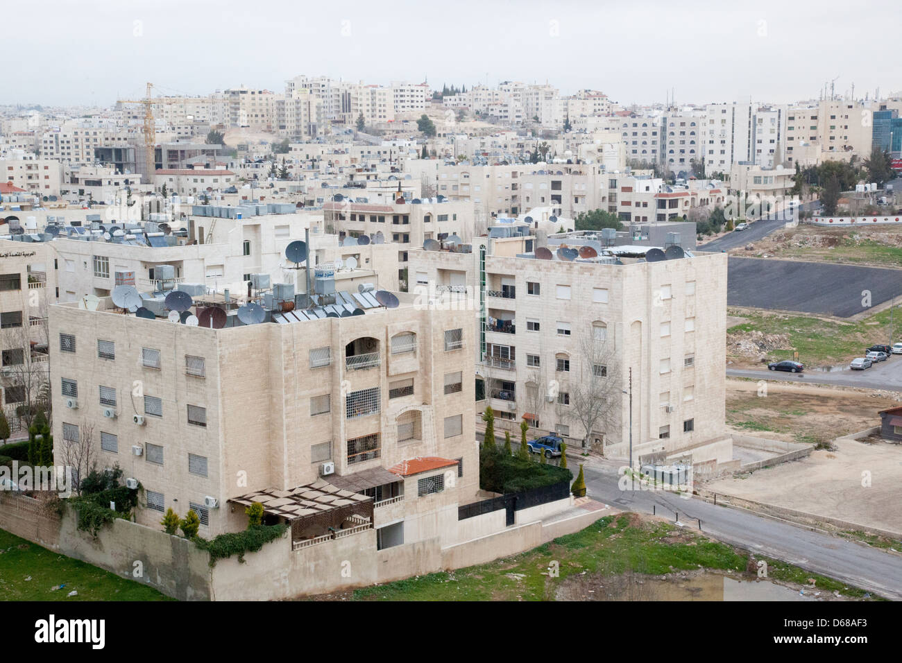 Amman, the capital city of Jordan, middle eastern country, apartments and  businesses Stock Photo - Alamy