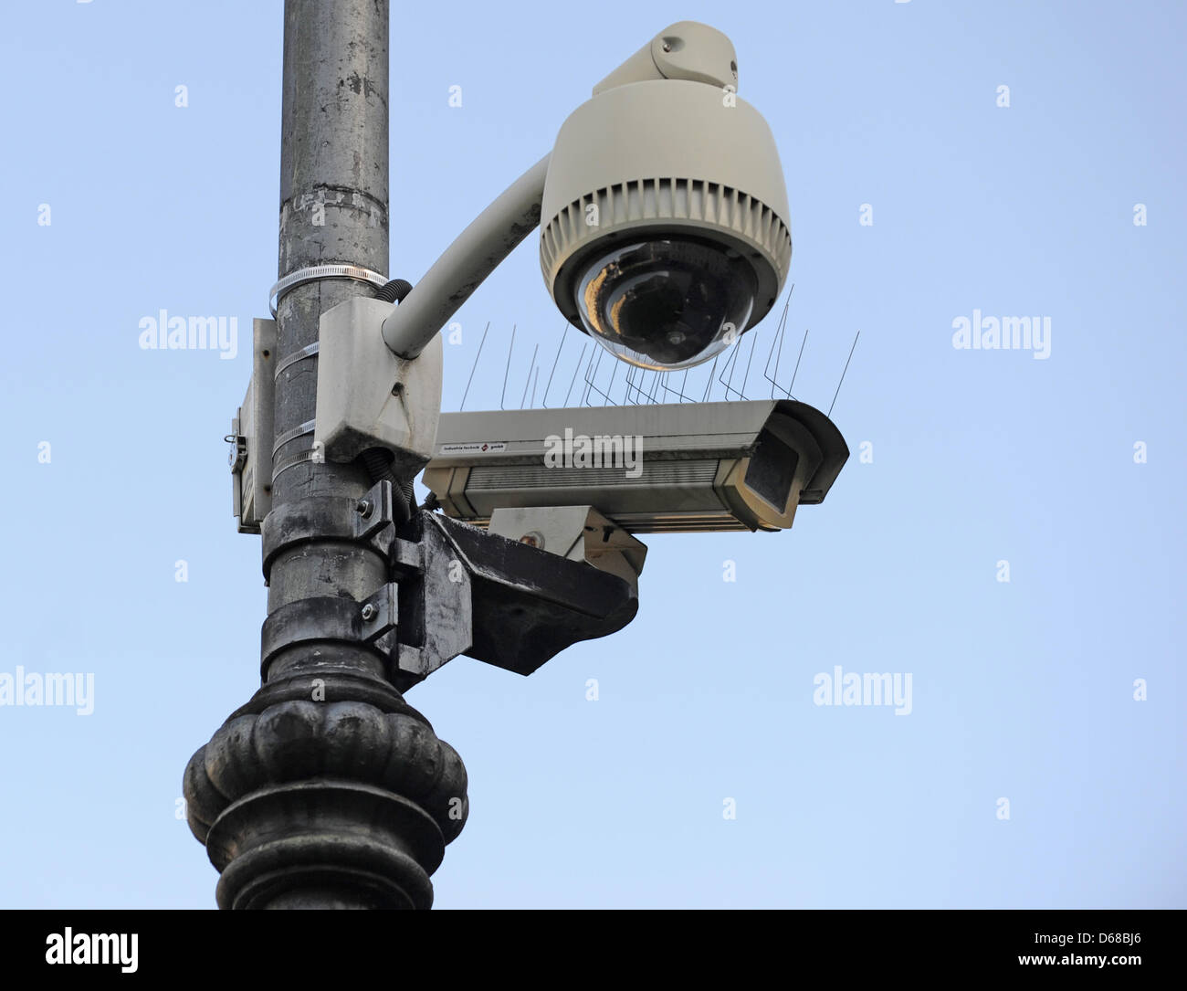 Two surveillance cameras are pictured near Odeonplatz in Munich