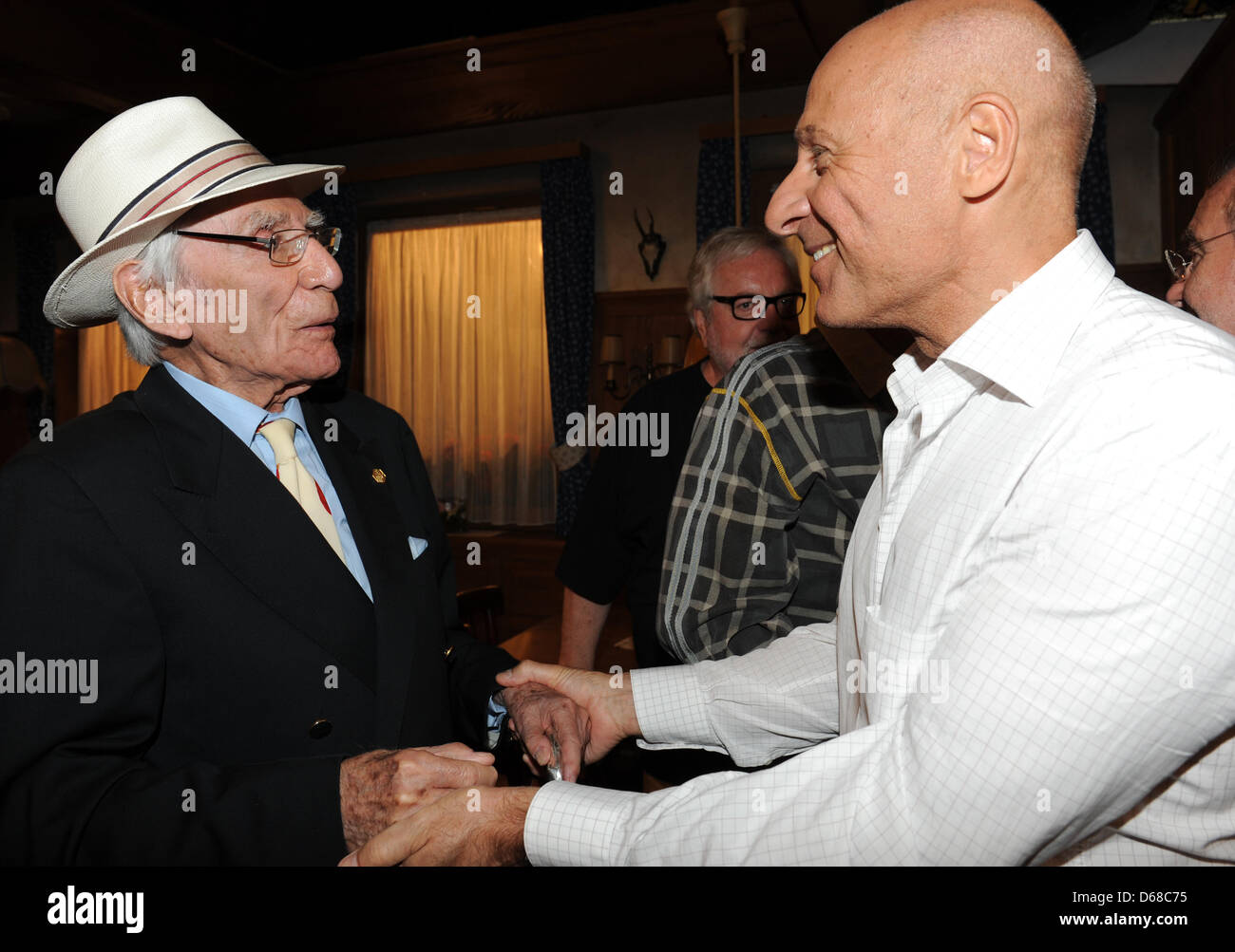 Swiss actor Lukas Ammann (L) talks to actor Edgar-M. Marcus in Baden ...