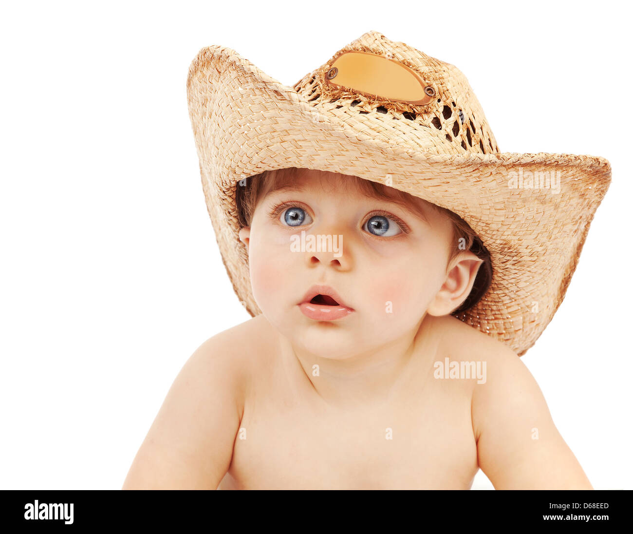 Closeup portrait of adorable baby boy wearing cowboy hat isolated on white background, happy childhood concept Stock Photo