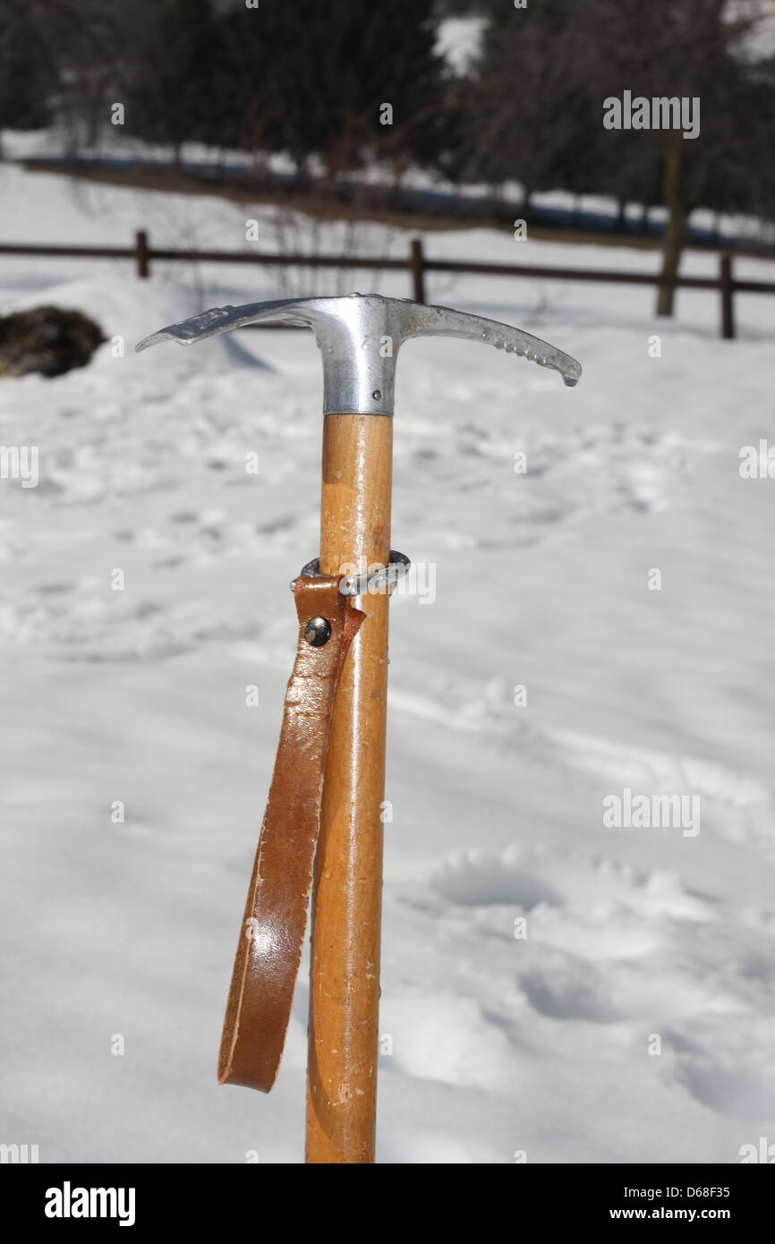 ice axe for professional ice climbing with sturdy wood handle Stock Photo